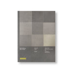 Grey book cover printed on a craft paper. Nine-squares greed takes two-third of the cover on the top. The book title and subtitle are placed below in silver. Horizontal pair of yellow lines at the lower-left corner. 