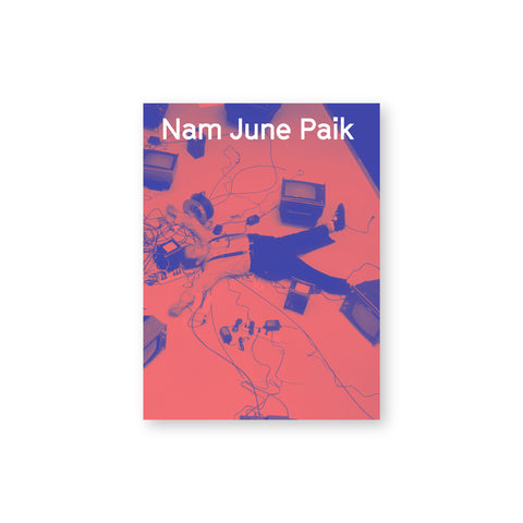 Book cover featuring an inverted color photo in pink and blue of a person lying on the ground surrounded by television sets and electronics and wires. Overlaid text at the top of the page reads: Nam June Paik.