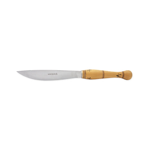 Long, wooden handled cheese knife with woodburned details and a slightly shiny finish. Nontron logo on the blade.