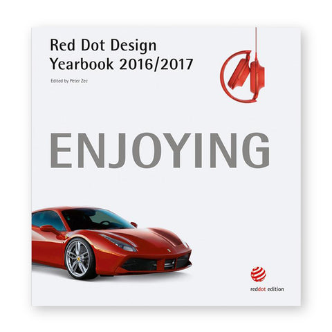 White book cover with red headphones and red sports car surrounding the word "Enjoying"