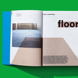 Interior spread of the Rem Koolhaas book, on a bright green background. The visible inside of the cover is bright blue, spread pages are white, with a translucent photo of a carpeted floor on the left-hand page, overlaid on a beige geometric shape covering the bottom half of the spread. The large word "floor" is highlighted in beige on the right-hand page.