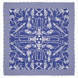 Indigo blue square textile covered in an off-white pattern of human and animal skeletons, the pattern repeats in cardinal directions. The skeleton pattern is bordered by a checkered pattern along all four edges.