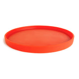 Large bright orange round tray with short rim.