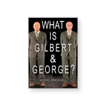 Rectangular book cover featuring a full length photo of two elderly men in drab suits staring blankly. Text overlaid reads: "What is Gilbert & George?"