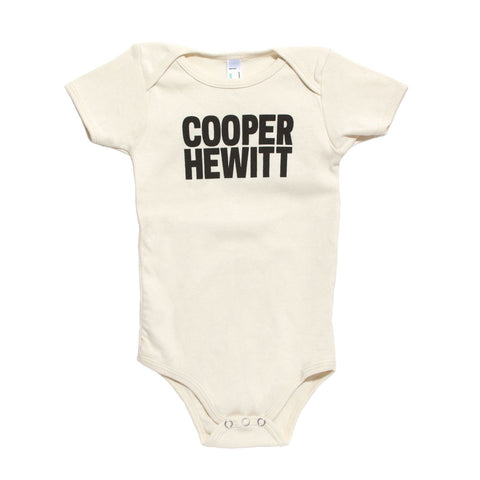 Off-white onesie with black bold text that reads 'COOPER HEWITT'