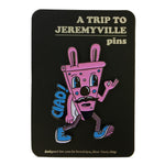Inside a blister back, a pin of Jethro as a slice of pink pizza with "Ciao!" up his left side. "A Trip to Jeremyville" is embossed at top.